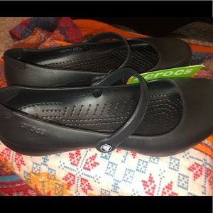 Brand new size 8 black resistant CROCS